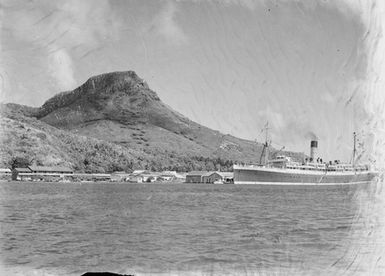 ["Managua" cruise ship by an island]