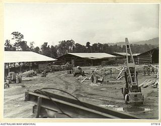 LAE BASE AREA, NEW GUINEA. 1944-12-27. NEW BUILDINGS UNDER CONSTRUCTION IN THE WORKSHOPS AREA OF THE 13TH WORKSHOPS AND PARK COMPANY