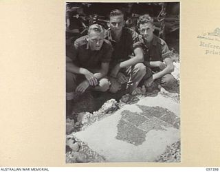 WEWAK POINT, NEW GUINEA. 1945-10-02. A SMARTNESS OF LINES COMPETITION WAS HELD AT 2/3 MACHINE-GUN BATTALION AND TROOPS WERE GIVEN A WEEK TO DECORATE THEIR LINES. THE COMPETITION WAS WON BY THIS 10 ..