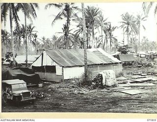 LAE, NEW GUINEA. 1944-03-29. OFFICES AND STORE ROOMS WITHIN THE AREA OF THE 43RD FIELD ORDNANCE DEPOT