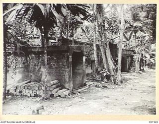 BUIN AREA, BOUGAINVILLE. 1945-09-28. ENTRANCES TO THE UNDERGROUND WIRELESS STATION AND COMMUNICATION CENTRE CONSTRUCTED OF REINFORCED CONCRETE AT THE JAPANESE NAVAL HEADQUARTERS IN THE BUIN AREA. ..