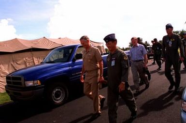 LT. COL. Kim, commander of the Air Transportable Hospital, accompanies Admiral Joseph W. Prueher during his visit to Andersen AFB, Guam