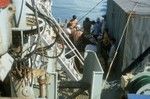 Loading explosives into [Taiwanese research vessel] Chiu Lien, Guam