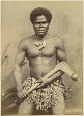 Portrait of Willama Lelock, holding a battleaxe, New Caledonia, ca. 1870 / photographed by W. & E. Dufty