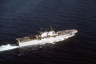 A starboard quarter view of the amphibious assault ship USS SAIPAN (LHA-2) underway. The SAIPAN is taking part in exercise Ocean Venture '81