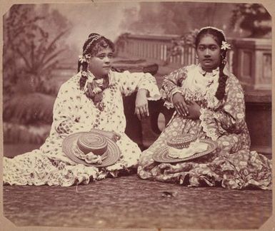 Two women sitting with hats in their laps. From the album: Tahiti, Samoa and New Zealand scenes