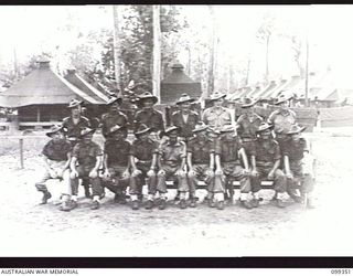 TOROKINA, BOUGAINVILLE, 1945-12-03. MEMBERS OF THE SIGNALS AND MORTAR PLATOON, HEADQUARTERS COMPANY, 8TH INFANTRY BATTALION
