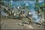 Killing pigs at a feast, probably at Ngarinaasuru