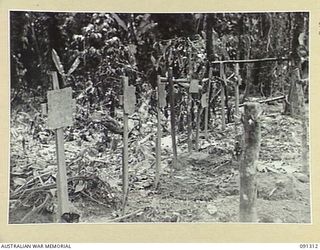 The graves of personnel killed in action between 28 March and 5 April 1945 at Slater's Knoll, Bougainville. The first grave is that of VX130281 Lieutenant Sydney Maurice Giles, 5th Field Company ..