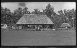 Individuals in front of building