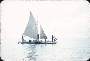 New Year's Day Sports, 1957, canoe race showing one canoe with full sails : Mapamoiwa Station, D'Entrecasteaux Islands, Papua New Guinea, 1957 / Terence and Margaret Spencer