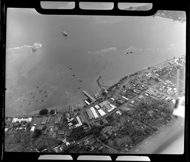 Apia, Upolu, Samoa, showing village and harbour