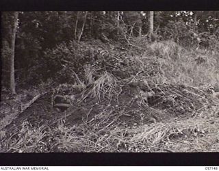 SOGERI VALLEY, NEW GUINEA. 1943-09-24. FRONT VIEW OF THE PILLBOX (NOT CAMOUFLAGED) WHICH WAS CONSTRUCTED TO TEST THE EFFECTIVENESS OF THE PROJECTOR INFANTRY TANK ATTACK MARK 1