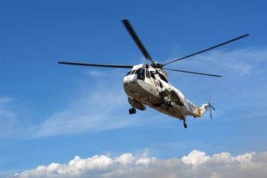 The Outrider 50, a U.S. Navy UH-3H Sea King helicopter, also known as"Kekaha Town,"lands for the final time at the Pacific Air Museum, Ford Island, Hawaii, on Aug. 28, 2006. The helicopter is one of three aircraft being decommissioned from the Pacific Missile Range Facility on Kuaui, Hawaii. It has logged more than 13,500 flight hours during its almost 40-years of service with Navy. (U.S. Navy photo by CHIEF Mass Communication SPECIALIST Joe Kane) (Released)