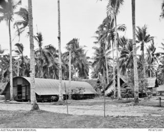 LUNGGA, GUADALCANAL, SOLOMON ISLANDS, 1943-10-14. THE QUONSET HUT THAT SERVED AS THE OFFICE FOR THE DEPUTY SUPERVISING INTELLIGENCE OFFICER (DSIO), NAVAL INTELLIGENCE DIVISION, RAN, AT HIS ..