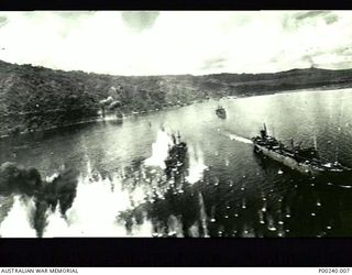 RABAUL, 1943-11-02. AIR STRIKE BY 75 B.25 MITCHELL BOMBERS AND 80 P38 LIGHTNING AIRCRAFT OF THE FIFTH AIR FORCE ON JAPANESE SHIPPING IN SIMPSON HARBOUR. (DONOR: W. TUCK)