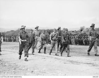 CAPE WOM, NEW GUINEA. 1945-09-13. LIEUTENANT GENERAL H ADACHI, COMMANDER 18 JAPANESE ARMY IN NEW GUINEA, FORMALLY SURRENDERED TO MAJOR GENERAL H C H ROBERTSON, GENERAL OFFICER COMMANDING 6 ..