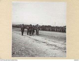 CAPE WOM, NEW GUINEA, 1945-09-13. LIEUTENANT-GENERAL H. ADACHI, COMMANDER 18 JAPANESE ARMY IN NEW GUINEA, FORMALLY SURRENDERED TO MAJOR-GENERAL H.C.H. ROBERTSON, GENERAL OFFICER COMMANDING 6 ..