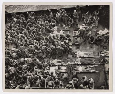 Photograph of 221 Japanese Prisoners of War Aboard Landing Craft