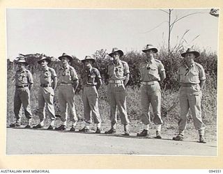 LAE AREA, NEW GUINEA, 1945-08-05. OFFICERS OF 151 GENERAL TRANSPORT COMPANY. IDENTIFIED PERSONNEL ARE:- CAPTAIN S.J. DOWMAN (1); CAPTAIN E.F. RANDELL (2); CAPTAIN J.L. CHAPMAN (3); CAPTAIN H.A. ..