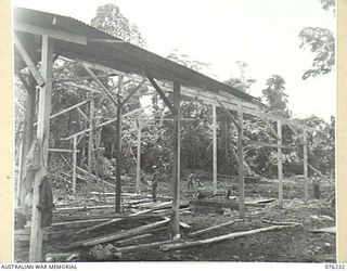 LAE, NEW GUINEA. 1944-09-27. A BUILDING UNDER CONSTRUCTION AT THE 43RD FIELD ORDNANCE DEPOT