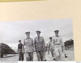 JACQUINOT BAY, NEW BRITAIN, 1945-06-16. THE GOVERNOR GENERAL OF NEW ZEALAND, MARSHAL OF THE ROYAL AIR FORCE, SIR CYRIL L.N. NEWALL (2) WITH MAJ-GEN H.C.H. ROBERTSON, GOC 5 DIVISION (1) AND WING ..