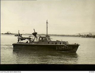 Torokina, Bougainville. 1945-04. HMA Motor Launch AM1496, a thirty eight foot fast supply launch engaged in special intelligence duties in the Solomons - New Ireland area