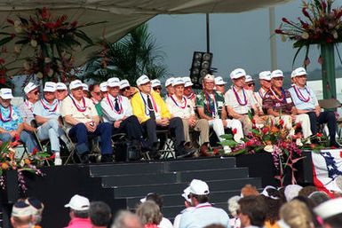 Crew members of the USS ARIZONA who survived the Dec. 7, 1941, attack on Pearl Harbor sit on stage during Remembrance Day ceremonies at the USS ARIZONA Memorial Visitors Center. The survivors are honored on the 50th anniversary of the Japanese bombing