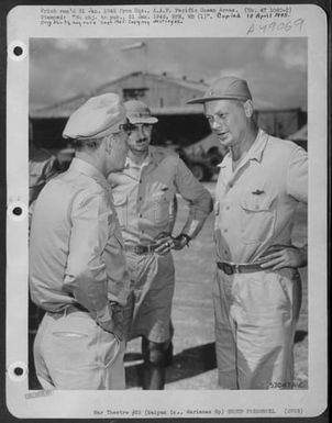 Lt. Gen. Millard F. Harmon, C.G., Aaf, Pacific Ocean Areas, And Deputy Commander, 20Th A.F., Chats With Brig. Gen. Truman H. Landon, C.G., Vii Bomber Command, During Gen. Harmon'S Visit To Saipan On 5. Dec. 1944. (U.S. Air Force Number 57047AC)