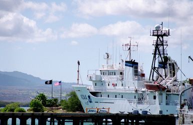 Port side (off centerline) view of the National Oceanographic and Atmospheric Administration research ship NOAA KAIMIMANA (R 333) (formerly Titan (T-AGOS 15) tied up at the Bishop Point wharf at the entrance to Pearl Harbor