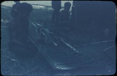 Sewing sago palm leaves for roofing : Mapamoiwa Station, D'Entrecasteaux Islands, Papua New Guinea, 1956-1959 / Terence and Margaret Spencer
