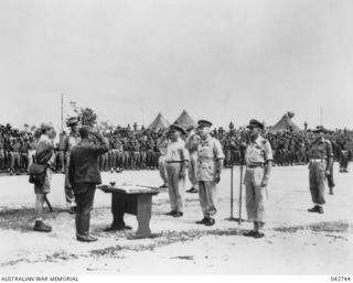 Cape Wom, Wewak, New Guinea. 1945-09-13. Lieutenant General Hatazo Adachi, General Officer Commanding VX111 Japanese Army, accompanied by an interpreter, arrives to attend the surrender ceremony, ..