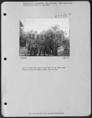 Joe E. Brown and some of the men of the 38th Bomb Group at Port Moresby, Papua, New Guinea. (U.S. Air Force Number 3A32864)