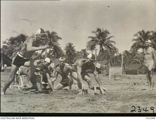 AITAPE, NORTH EAST NEW GUINEA. C. 1945-04. SINCE THE RAAF ORGANISED SURF PATROLS ALONG NORTH NEW GUINEA COAST, MANY LIVES HAVE BEEN SAVED. WITHIN TEN DAYS OF THE FORMATION OF THIS PATROL, TWELVE ..