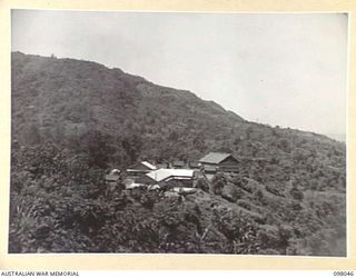 NAMANULA, RABAUL, NEW BRITAIN. 1945-10-15. THE GENERAL OFFICER COMMANDING'S AREA, HEADQUARTERS 11 DIVISION, SHOWING THE COMMANDER'S HOUSE AND MESS SITUATED ON THE OLD GOVERNMENT HOUSE SITE