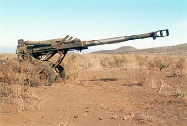 A M198 155mm Medium Towed Howitzer from Bravo Battery, 1ST Battalion, 12th Marines, 3rd Marine Regiment during a combined arms live fire exercise. The M198 is constructed of aluminum and steel, and is air transportable by CH-53E helicopter and C-130 or larger fixed-wing aircraft. Maximum effective range with conventional ammunition is 22,400 meters (13.92 miles) and with a rocket-assisted projectile, 30,000 meters (18.64 miles)