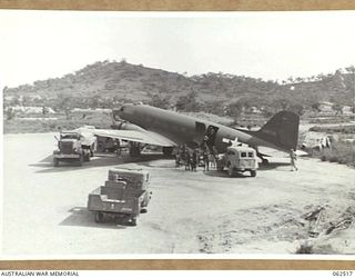 WARD'S DROME, PORT MORESBY AREA, PAPUA, NEW GUINEA. 1944-01-05. TROOPS OF THE 2/11TH AUSTRALIAN INFANTRY BATTALION AND THE 2/33RD AUSTRALIAN INFANTRY BATTALION, 25TH AUSTRALIAN INFANTRY BRIGADE ..