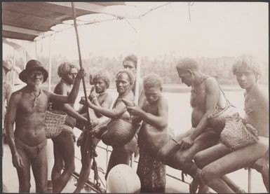 Vella Lavella visitors gathered against rail on board the Southern Cross, Solomon Islands, 1906 / J.W. Beattie