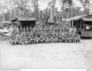 Group portrait of personnel of A Squadron Workshops, 2/4th Armoured Regiment. Left to right, back row: VX191992 Craftsman (Cfn) R L Bartlett of Nilwa, Vic; NX80554 Cfn L Marshall of Petersham, NSW; ..