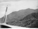 BOUGAINVILLE ISLAND. C. 1945-01. AERIAL PHOTOGRAPH OF THE MOSIGETTA AREA IN SOUTHERN BOUGAINVILLE ISLAND SHOWING THE TYPE OF COUNTRY IN WHICH PRESENT ACTION BY AUSTRALIAN MILITARY FORCES IS TAKING ..