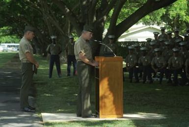 General (GEN) P.X. Kelley, commandant of the Marine Corps, addresses Marines at the Marine Barracks during his visit to the base. Sergeant Major (SGM) of the Marine Corps Robert E. Cleary stands to the left