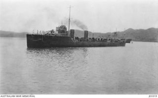 H.M.A.T.B.D. "YARRA" COMING TO AN ANCHORAGE AT PORT MORESBY - A VERY FINE SHELTER OFFERING PROTECTION BOTH FROM THE WEATHER AND POSSIBLE RAIDS BY THE ENEMY. (DONOR LIEUTENANT COMMANDER G.A. HILL, ..