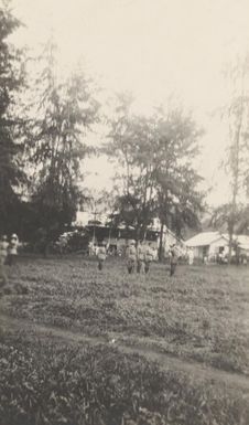 Colonel William Holmes and other officers taking the salute in German New Guinea, 1914