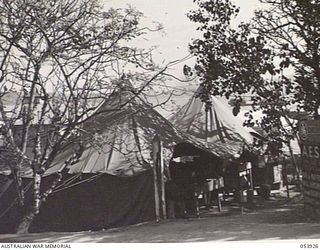 PORT MORESBY, NEW GUINEA. 1943-07-13. MAIN ENTRANCE TO THE AUSTRALIAN ARMY EDUCATION SERVICE