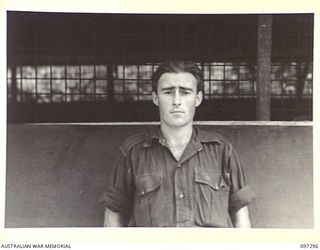 BOUGAINVILLE. 1945-09-28. LANCE SERGEANT H.K. MAGUIRE, AUSTRALIAN NEW GUINEA ADMINISTRATIVE UNIT RHODES SCHOLAR CANDIDATE