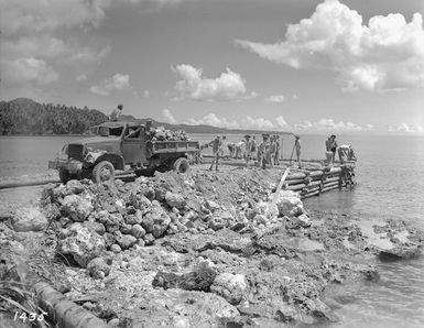 Military truck, and a jetty built by World War II New Zealand soldiers, Maravari, Vella Lavella Island, Solomon Islands