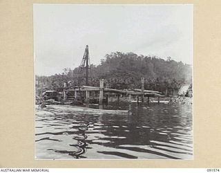 WIDE BAY, NEW BRITAIN. 1945-05-02. PERSONNEL OF 13 FIELD COMPANY, ROYAL AUSTRALIAN ENGINEERS, AT WORK ON THE CONSTRUCTION OF NEW DOCKS
