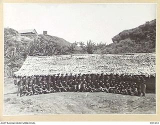 WEWAK POINT, NEW GUINEA. 1945-10-02. A FORMAL GROUP OF A COMPANY, 2/3 MACHINE-GUN BATTALION