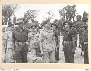 TOROKINA, BOUGAINVILLE. 1945-07-03. HIS ROYAL HIGHNESS, THE DUKE OF GLOUCESTER, GOVERNOR-GENERAL OF AUSTRALIA (2), ACCOMPANIED BY MAJOR A.N. LAWSON, 61 INFANTRY BATTALION, 7 INFANTRY BRIGADE (1), ..