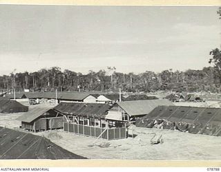 BOUGAINVILLE ISLAND. 1945-01-29. A GENERAL VIEW OF THE 21ST AUSTRALIAN GENERAL HOSPITAL AT THE 1945-01-30, SHOWING THE PROGRESS MADE IN THE CONSTRUCTION OF THE UNIT
